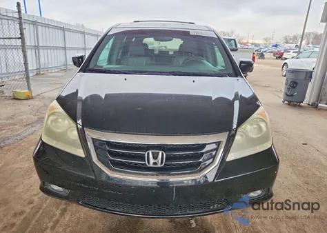 2010 Honda Odyssey Touring z USA, uszkodzony, nr VIN 5FNRL3H92AB107332